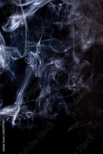 Smoke motion on black background.