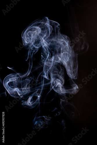 Smoke motion on black background.