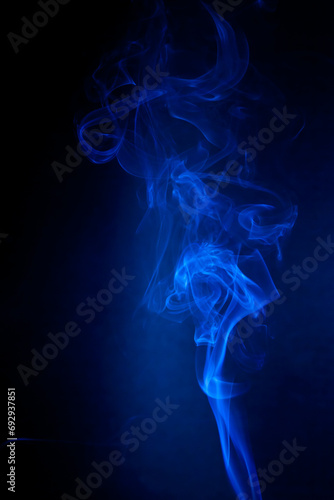 Blue smoke motion on black background.