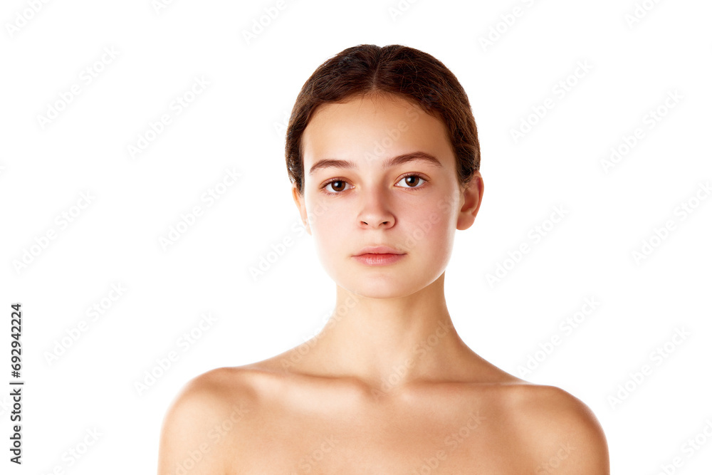 Portrait of young beautiful girl with clear, spotless skin, without makeup standing with bare shoulders over white background. Concept of natural female beauty, skin care, cosmetology and cosmetics Portrait of young beautiful girl with clear, spotless skin, without makeup standing with bare shoulders over white background. Concept of natural female beauty, skin care, cosmetology and cosmetics