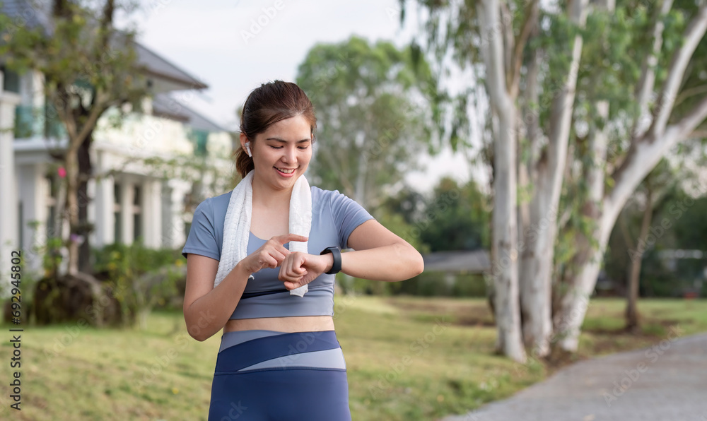 Beautiful Asian woman in sportswear is jogging together or jogging in the park. To take care of your health and be strong Beautiful Asian woman in sportswear is jogging together or jogging in the park. To take care of your health and be strong