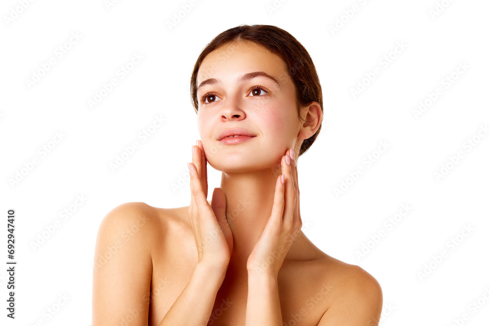 Portrait of attractive, tender girl with beautiful spotless healthy skin without makeup against white background. Concept of natural female beauty, skin care, cosmetology and cosmetics Portrait of attractive, tender girl with beautiful spotless healthy skin without makeup against white background. Concept of natural female beauty, skin care, cosmetology and cosmetics