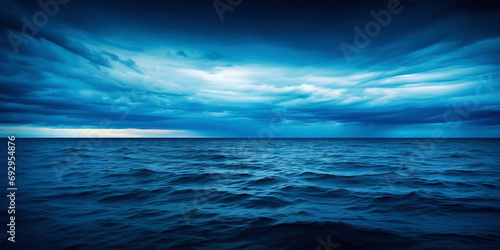 Dark sea surface with a dramatic cloudy sky above. Approaching storm. Generative AI © AngrySun