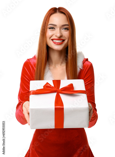 Young woman in red dress with Christmas gift on white background