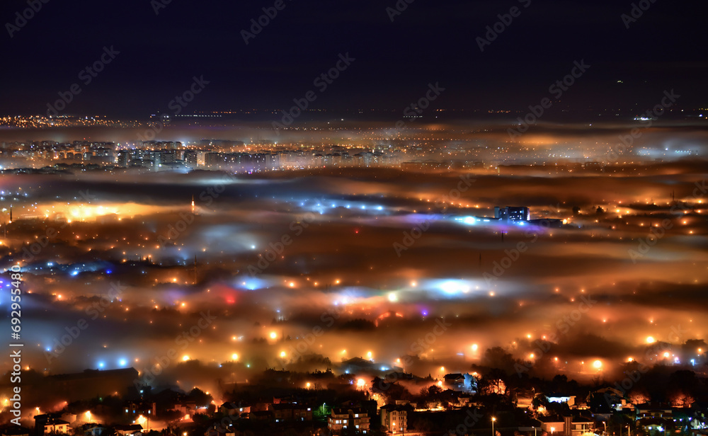 Lights of the City Under the Mists