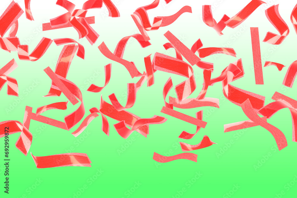 Bright red confetti falling on gradient green background Bright red confetti falling on gradient green background