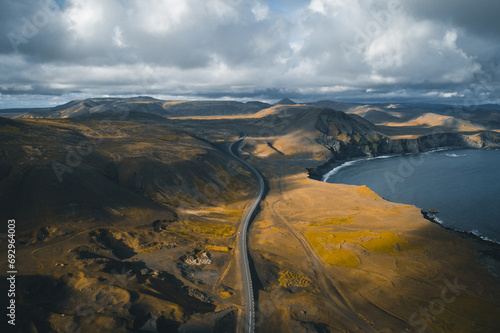 Golden Horizon: Aerial Panorama of Iceland's Coastal Majesty at Sunset (ID: 692964003)