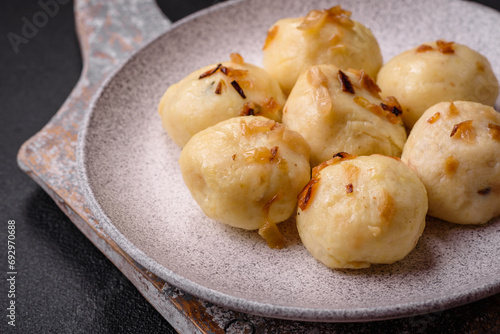 Delicious fresh cooked homemade dumplings with cheese, potatoes and salt