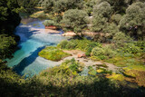 Clear Water River in Blue Eye. Beautiful Above View of Water and Nature with Green Trees in Southern Albania.