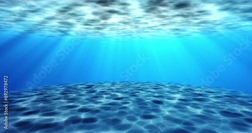 
4K Realistic surreal underwater seabed moving water animation. Looping animation of water ocean waves moving underwater with camera zoom in effect. Sunbeam tranquility transparent sea water in UHD. photo