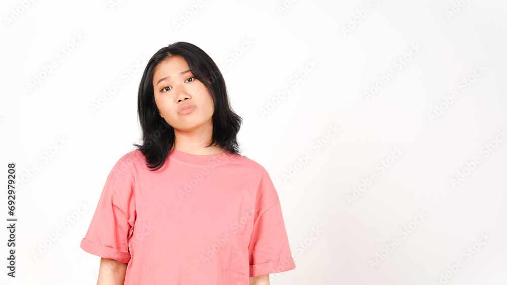 Young Asian woman in pink t-shirt doing cry sad face expression isolated on white background Young Asian woman in pink t-shirt doing cry sad face expression isolated on white background