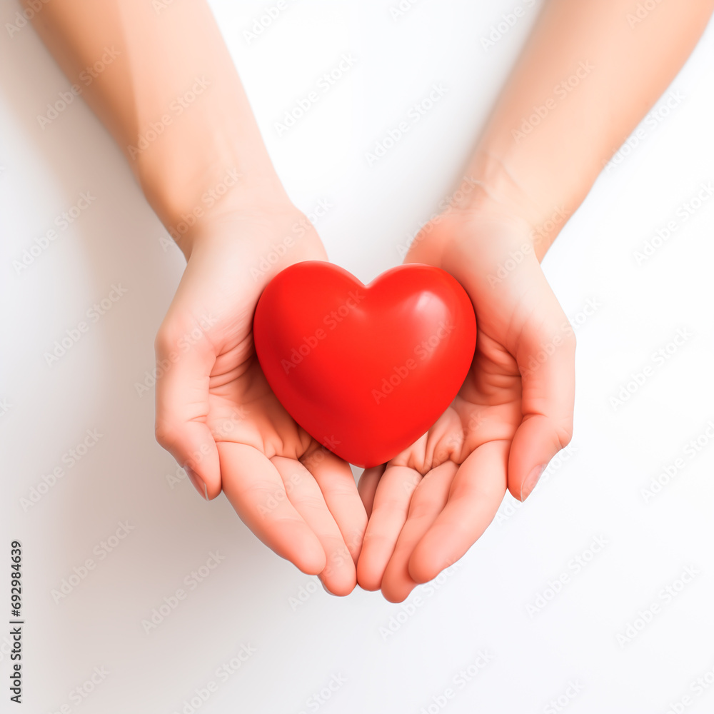 Hands cradling red heart, symbol of care and love. Valentines Day concept. Copy space.
Hands cradling red heart, symbol of care and love. Valentines Day concept. Copy space.
