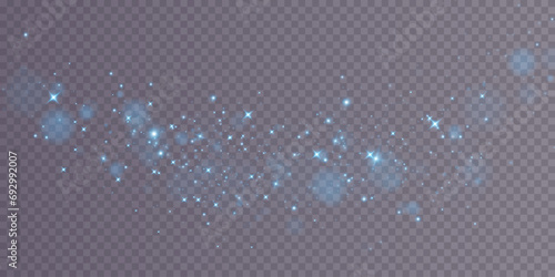 Bokeh, dust sparks and blue stars glow with special light. Vector sparks on transparent background. Christmas light effect. Sparkling magic dust particles.