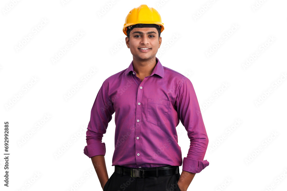 Handsome indian man wearing yellow hardhat posing with arms crossed in studio Handsome indian man wearing yellow hardhat posing with arms crossed in studio