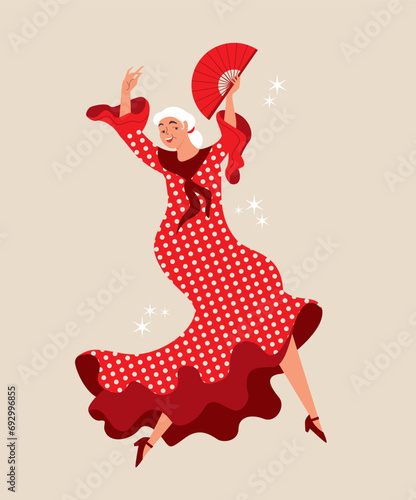 Senior lady dancing Spanish flamenco.  Aged lady dancing. Spanish culture. Active retirement concept.