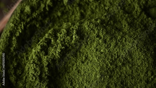 Matcha green tea powder rotating close up view