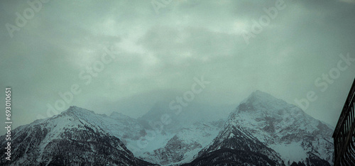 landscapes of the Aosta Valley with snow-capped mountains in the winter during the Christmas holidays