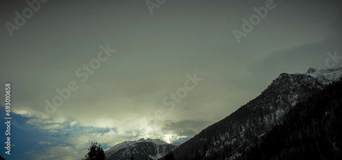 landscapes of the Aosta Valley with snow-capped mountains in the winter during the Christmas holidays