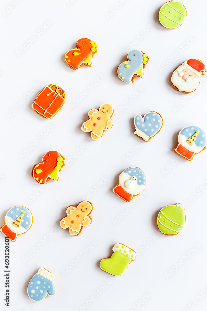 Pattern of Christmas cookies in the shape of a dragons and Santa. New Years decoration background