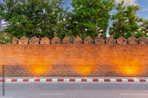 Chiangmai Chiang mai old city brick wall. the castle wall was built to protect the city surrounded by water in north Thailand photo