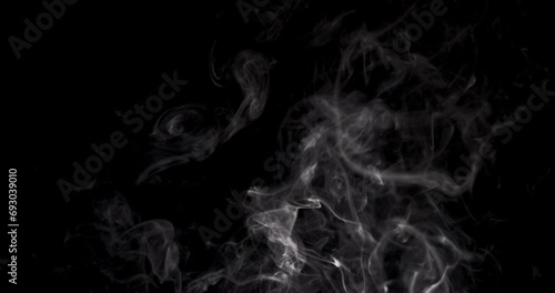 Natural white smoke on a black background photo
