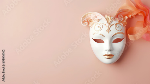 venetian carnival mask in the color of the year  2024 peach fuzz , with copy space  photo