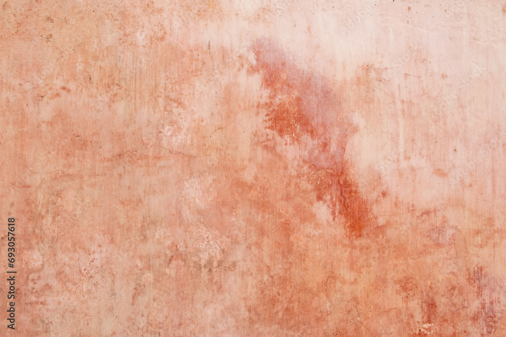 Texture of old rustic wall covered with pink stucco. Abstract background for design