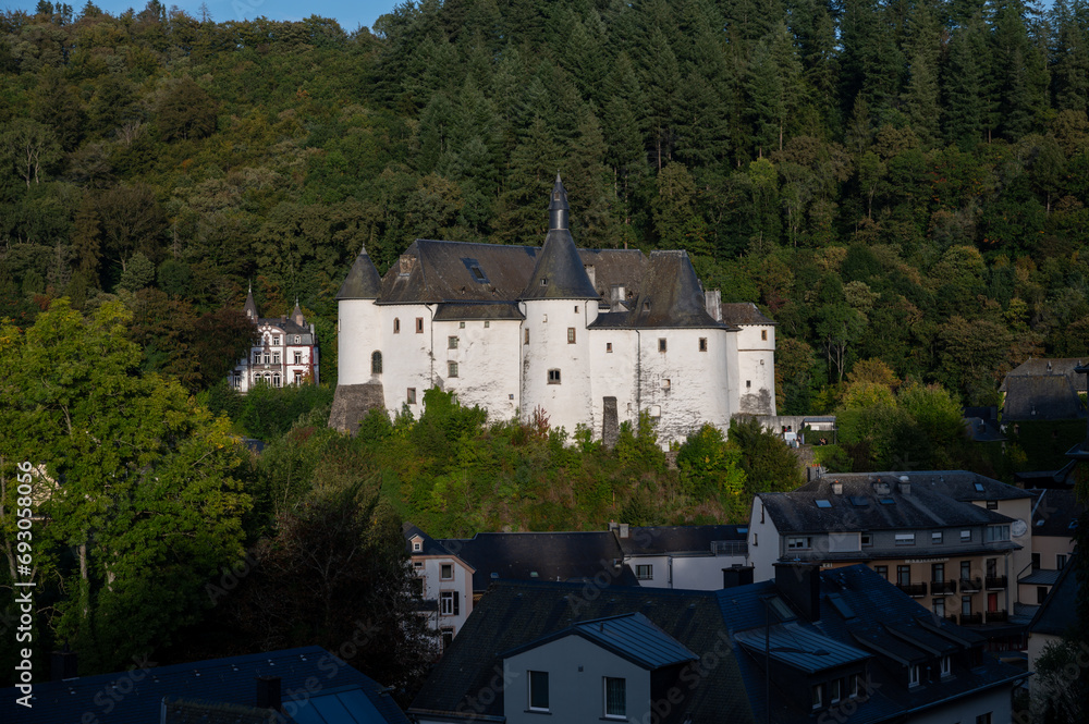 Views of Clervaux commune with town status in northern Luxembourg, capital of  canton of Clervaux, white castle on sunset