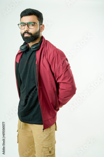 Handsome man in stylish jacket on white background