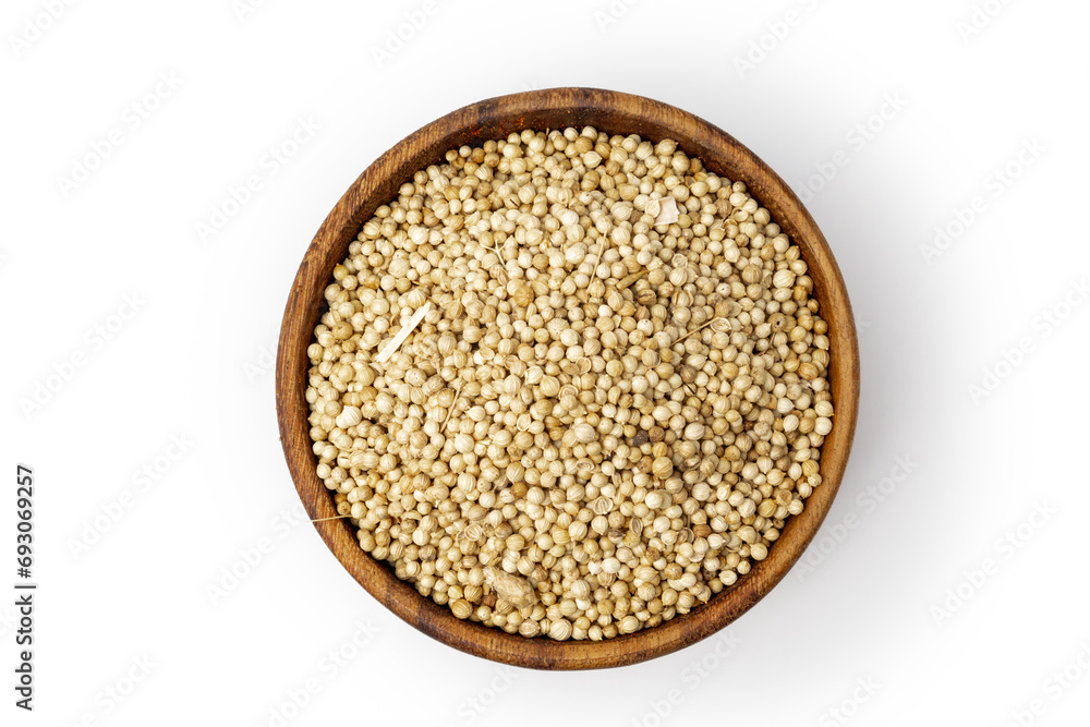 dried coriander seeds in wooden bowl, isolated in white background, concept of spice catalog, top view dried coriander seeds in wooden bowl, isolated in white background, concept of spice catalog, top view