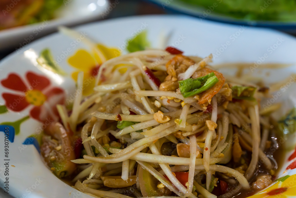 Spicy papaya salad with fermented fish it native thai food style spicy Spicy papaya salad with fermented fish it native thai food style spicy
