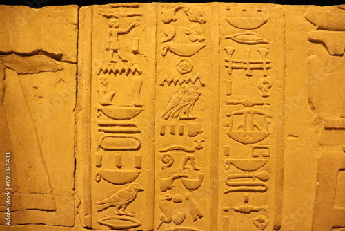 ancient egyptian hieroglyphics at Kom Ombo temple  photo
