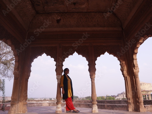Indian girl traveling in jawahar Burj in lohagarh fort of bharatpur rajasthan a tourist places of India, selective focus  photo