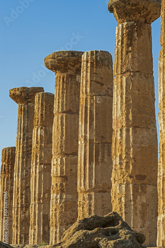 Famous eight columns of the Temple of Heracles or Hercules, known as Tempio di Eracle in Italian. Valley of the Temples, Agrigento, Sicily, Italy. photo