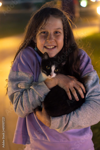 a girl with a cat