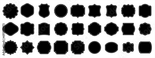 Set of black blank labels with cute white frame vector illustration isolated on white. Price tag, sale sticker, quality mark, sale or discount sticker, promotional badge set, shopping labels photo
