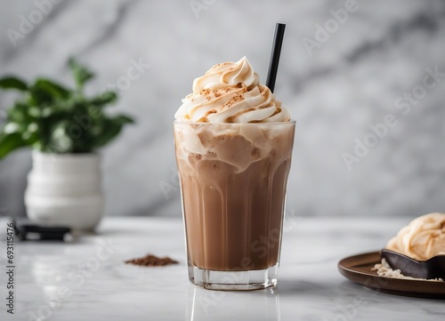 Close up view of iced mocha latte on white marble background