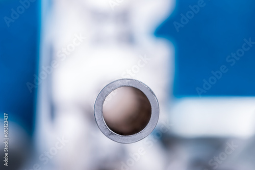 Bilde på lerret Single aluminum pipe, cross section view, with blurred background