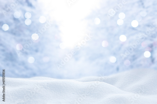 winter snowy blurred defocused blue background © Olha Kapusniak