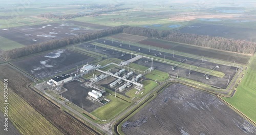 Largest gas field in Europe located in Groningen, below Slochteren, emphasizing industrial mining and extraction sites photo