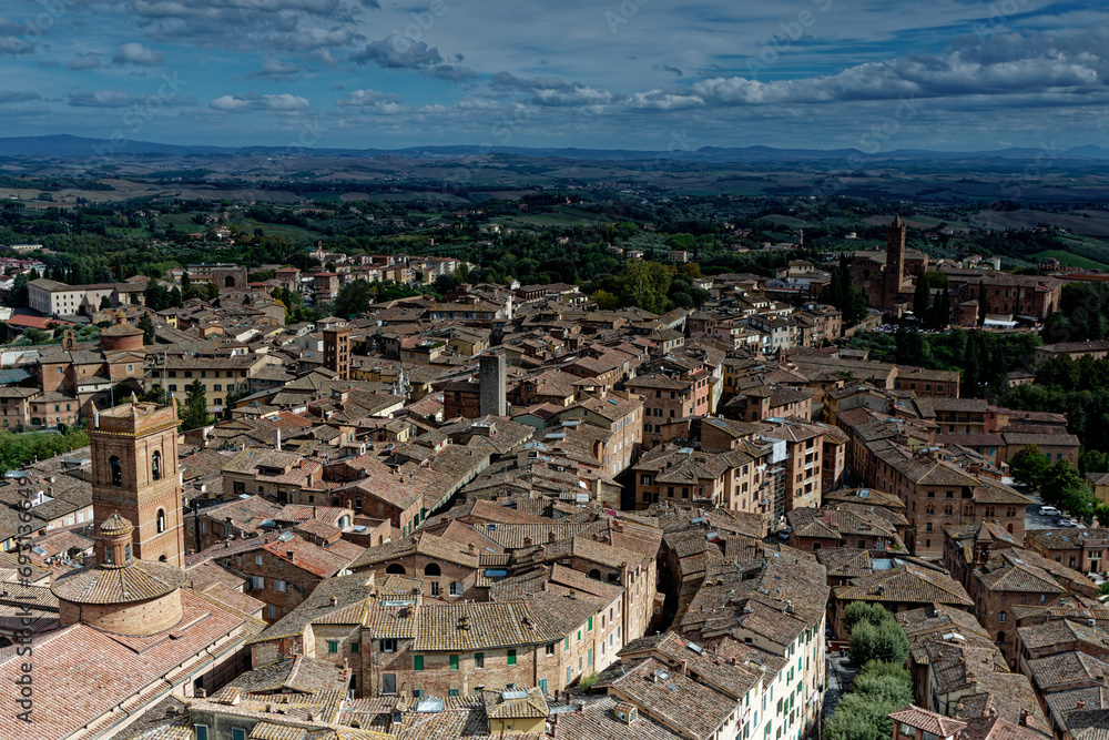 Siena. Old Medieval city in Tuscany in Italy Europe. Art and culture. Tourists from all over the world for Piazza del Campo Palio Duomo Tower del Mangia and the oldest bank banco dei Paschi 