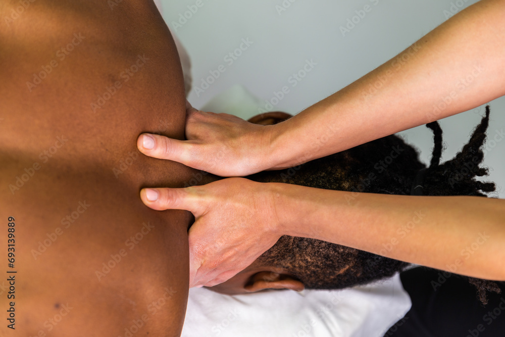 person getting massage in spa