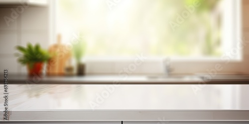 Blurred white modern kitchen background with empty corner countertop or table. photo