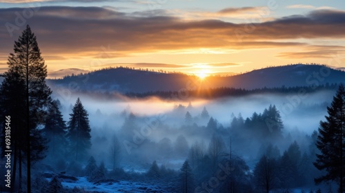  the sun is setting over the mountains in a foggy valley with pine trees in the foreground and fog in the foreground, with low lying clouds in the foreground.