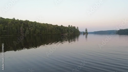 Silent lake in Bancroft, Northern Ontario, Canada. Beautiful magic wide view of wetlands wilderness. Quiet peaceful and serene meditation spot. Nature landscape at summer. photo