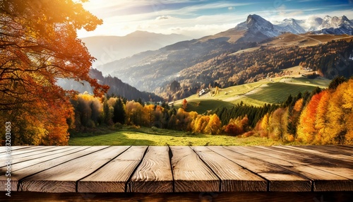 wood table in autumn landscape with empty copy space for product display © Kelsey
