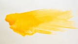 yellow stroke of watercolor paint brush on white background