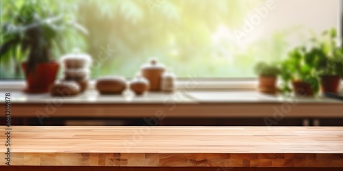 Wood table shelf on blurred kitchen background. For product display or design layout. Kitchen and cooking theme. With empty space.