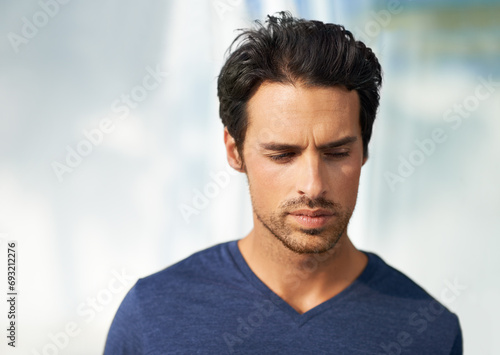 Man, thinking and sad or grief in home for lonely expression, mental health or wall background. Male person, thoughts and anxiety stress or disappointed depression or fail burnout, loss or fear risk