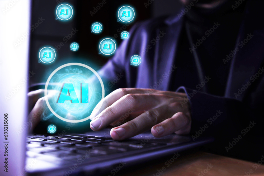 close up of a man using a computer with artificial intelligence icons. use of artificial intelligence close up of a man using a computer with artificial intelligence icons. use of artificial intelligence